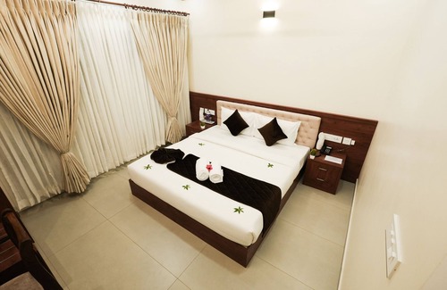 Kanjirappally Hotel | Royalton Residency