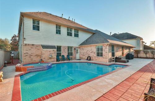 Champion Forest Villa | ROYCE mini-mansion with heated pool & spa Houston