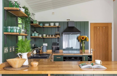 Chillington Cabin | Rural Woodland Lodge with Log Fire & Sunny Deck