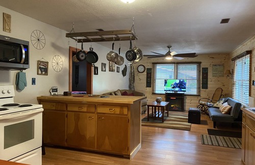 Prudenville House | Rustic home on wooded lot, very private. Lake and dock access. Close to trails.