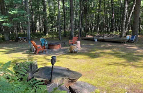 Prudenville House | Rustic home on wooded lot, very private. Lake and dock access. Close to trails.