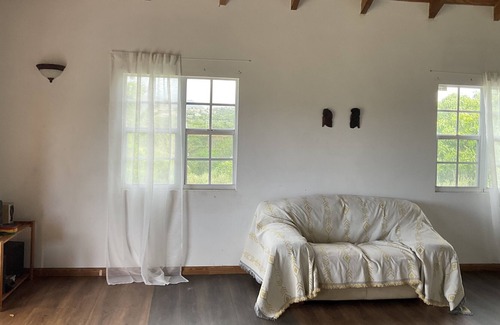 All Saints Villa | Rustic house on lush large land of fruit trees. 15 mins English Harbor