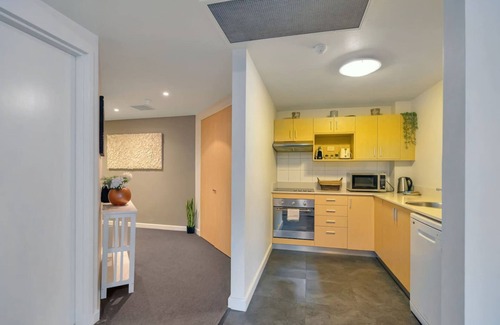 Darwin City Centre Apartment | Rustic Sunset Horizon Oceanview Balcony Dining