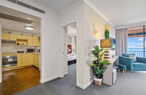 Darwin City Centre Apartment | Rustic Sunset Horizon Oceanview Balcony Dining