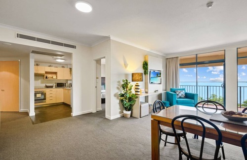 Darwin City Centre Apartment | Rustic Sunset Horizon Oceanview Balcony Dining