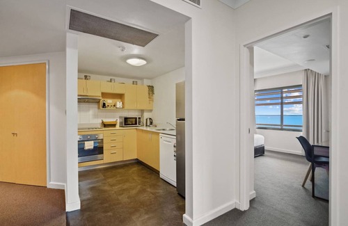 Darwin City Centre Apartment | Rustic Sunset Horizon Oceanview Balcony Dining