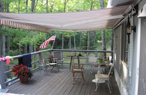 Mesick Cabin | Rustic Treehouse on fabulous private boating, fishing and swimming lake