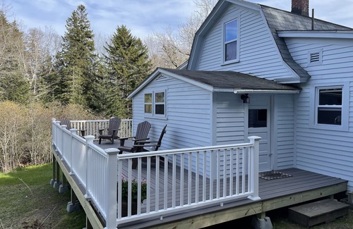 West Tremont House | Rustic vintage cottage in Duck Cove with limited ocean view.
