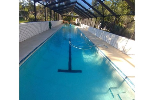 New Smyrna Beach House | RV NSB Sun & Shade Tree, Pool & Picnic RV Vacation