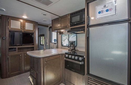 Madras House | RV Rental D21- Keystone Passport 32ft