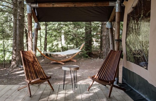 Grafton County RV Rental | Safari Tent Site 5 | 1 King Bed | Pond View
