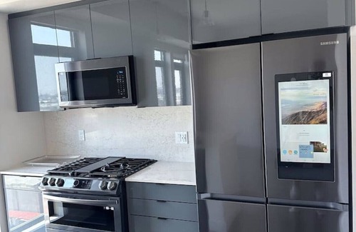 Vernon Apartment | Safe & Stylish 2BD Family Penthouse: Premium Perks