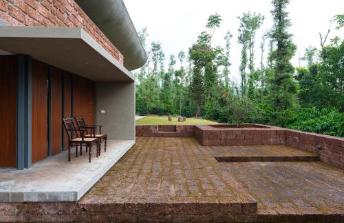 Mudigere Villa | SaffronStays Cafella- A 3-BDR elliptical-roof villa in Chikmagalur