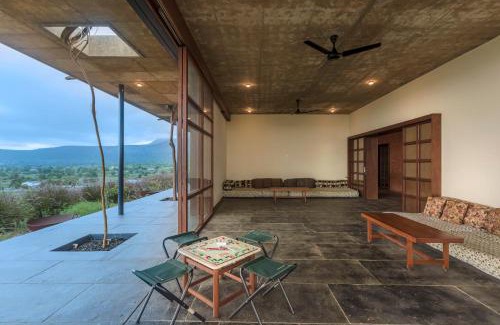 Igatpuri Villa | SaffronStays Zen, Igatpuri - lake-view villa with indoor and outdoor games