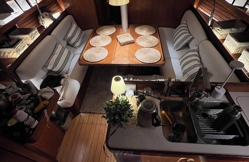 Mahon Boat Rental | Sailboat moored in the exclusive port of Mahon, ideal for couples and friends.