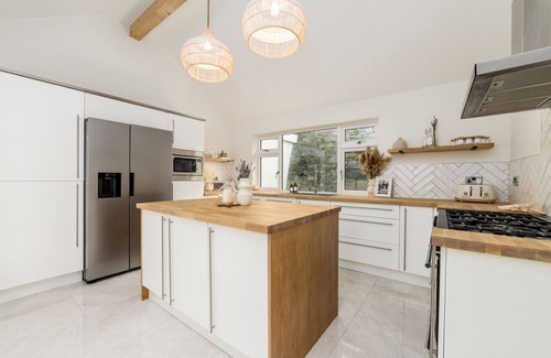 Port St Mary House | Salt Wood, a premium holiday home on the harbour in Port St Mary, perfect for groups.