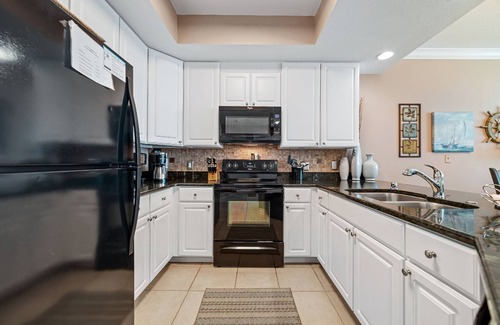 Gulf Shores Condo | San Carlos 807 ~ Pool, Sauna, Fitness + $400 in FREE Activities Daily ~ Zoo/Parasailing/Golf + More