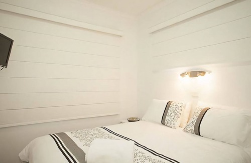 Sawtell Apartment | Sand and Sea 1 is a newly renovated, two bedroom ground floor unit, right next to the beach.