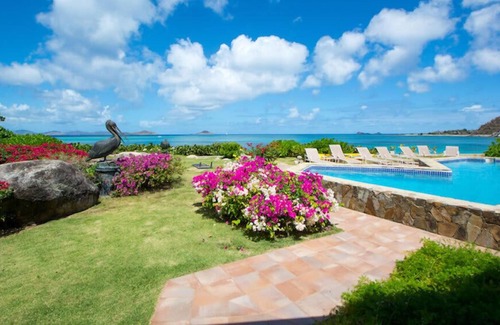 Spanish Town Villa | Sand Castle in Mahoe Bay by Personal Villas - Gazing Over the Tropical Gardens,