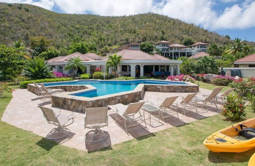 Spanish Town Villa | Sand Castle in Mahoe Bay by Personal Villas - Gazing Over the Tropical Gardens,
