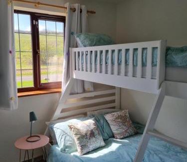 North Buckland House | Sandpiper Cottage: cosy home near the beach