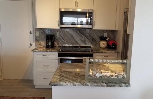 South Patrick Shores Condo | Sandpiper Towers- Be at home on the beach!
