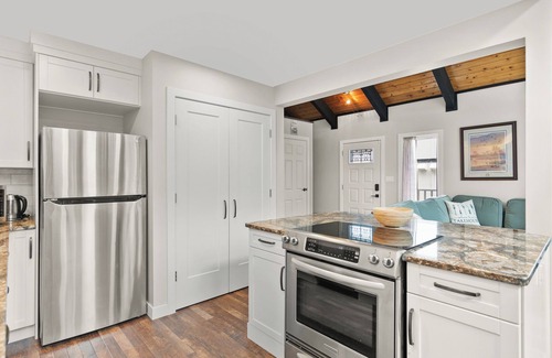 Sylvan Lake House | Sandy Beach Hideaway. Cozy and Bright. Entire house steps from the Sandy Beach!