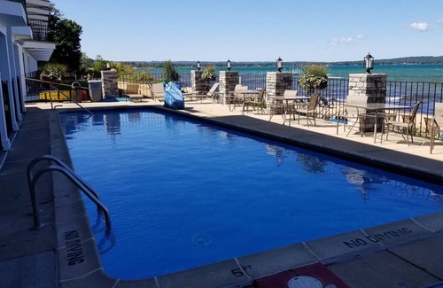 Traverse City House | Sandy Beach! Pool, air conditioning. Traverse City studio condo on the Bay