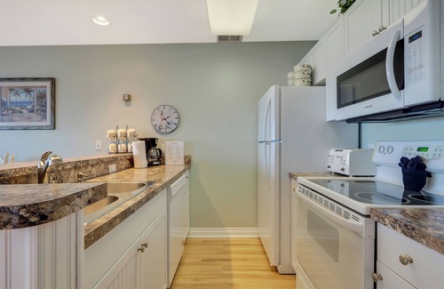 Traverse City Condo | Sandy Beachfront | Condo #107 | Sleeps 6 Guests
