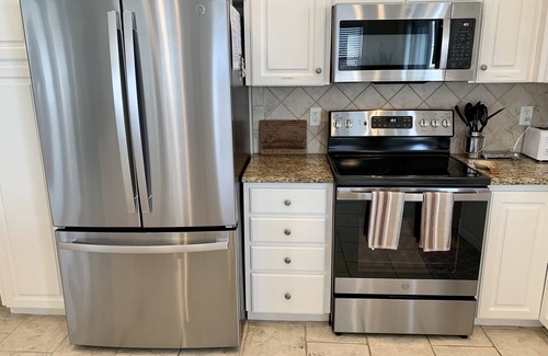 Surf City House | "Sandy Cheeks"- 4BR, 3BA, Unobstructed Ocean Views, Shared Pool, Elevator