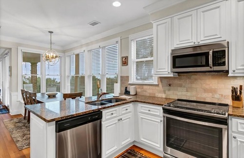 Isle of Palms House | Sandy Toes at 107 Grand Pavilion|Best Oceanfront View on Boardwalk|End Property|All New Bathroom|.