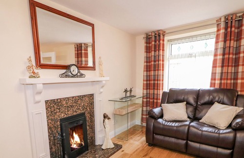 Annalong Cottage | SANDYMOUNT, pet friendly, with open fire in Annalong, County Down