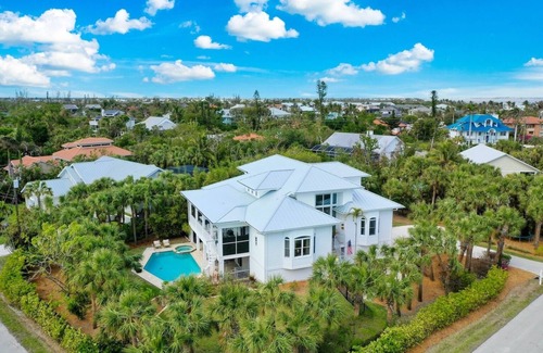 Shell Harbor House | Sanibel 6 bedroom Luxury Home with Pool,One Block from Beach,Pier and Canal View