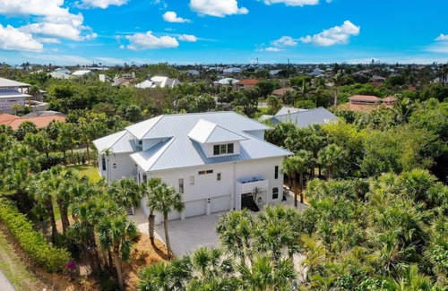 Shell Harbor House | Sanibel 6 bedroom Luxury Home with Pool,One Block from Beach,Pier and Canal View