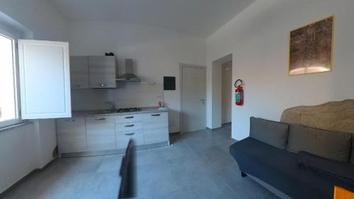 Sant'Antioco House | Sant Antioco Yellow Apartment with 2 Way Air Con