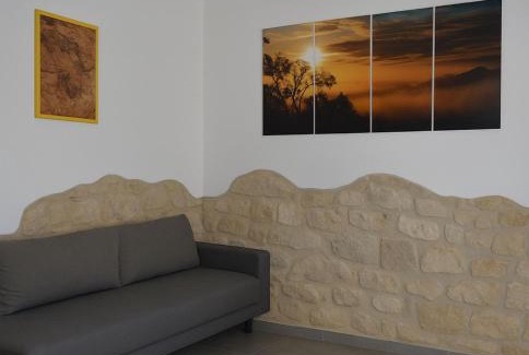 Sant'Antioco House | Sant Antioco Yellow Apartment with 2 Way Air Con