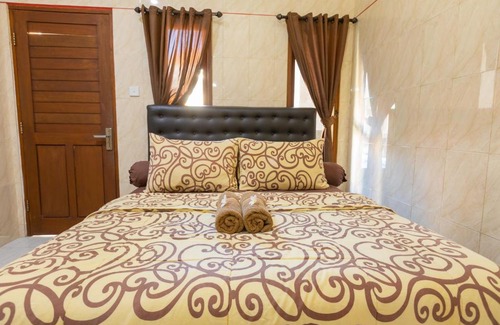 Downtown Kuta House | Santhi Graha Kuta by Devillas
