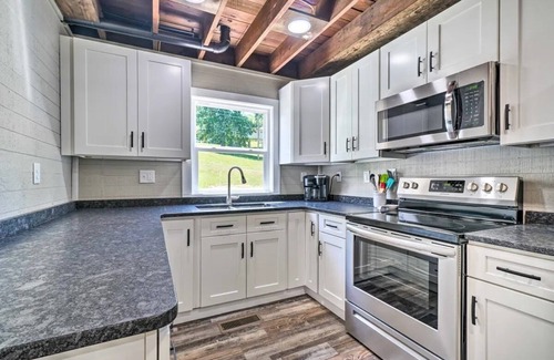 Caryville Cottage | Sapphire Cottage - Waterfront w/Covered Dock & Slide, Gentle Slope to Water