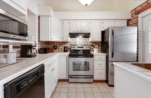 Historic District - North House | Savannah Historic District Row House + Sun Room!