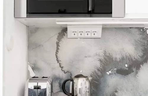 El Ejido Apartment | Scandinavian Styled Flat with French Balconies