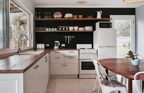 Cape Woolamai House | Scandinavian Summerhouse in lovely gardens stroll to the safe swimming beach