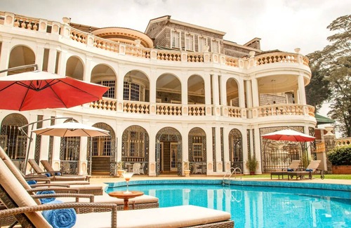Limuru House | Scenic Escape: Elegant Room Overlooking Lush Grounds