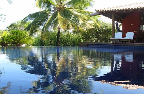 Sauipe Villa | Scenic Waterfront Villa - Overflow Pool & Tropical Landscape