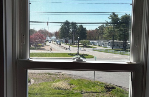 Wells Condo | Schoolhouse Loft by the Sea: ocean view, AC/heat, satellite WiFi, BBQ playground