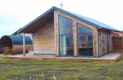 Selfoss Cabin | Sensational cabin with hot tub, sauna, fire place, 85" TV and magical views