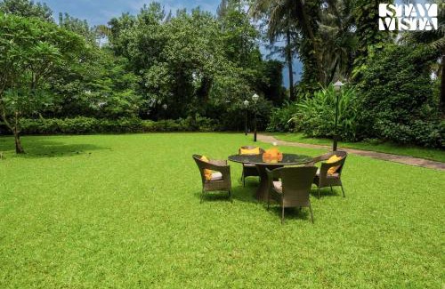 Nagaon Villa | Sea Breeze by StayVista - Beachside bliss with a splash of creativity with Pool, gazebo, lush lawn, and an artistically inspired house