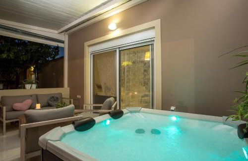 Petaloudes House | Sea Breeze & Nature villa ,near the sea, luxury jagguzi and spa private garden