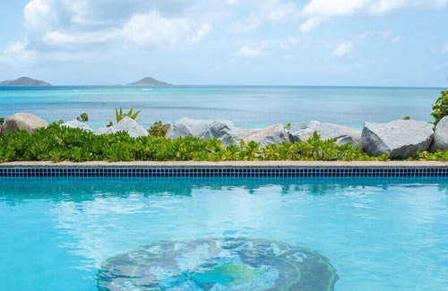 Spanish Town Villa | Sea Fans Mahoe Bay by Personal Villas - Ocean Front, Lush Tropical Gardens