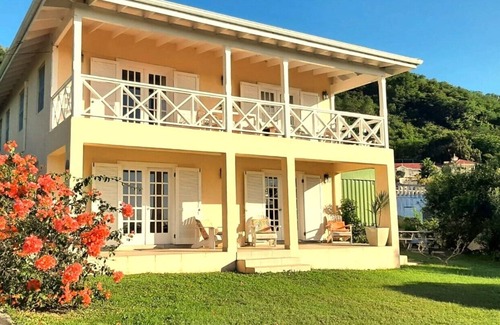 Fryes Beach Apartment | Sea View Terrace, enjoy a short walk to the beach & beautiful evening sunsets.