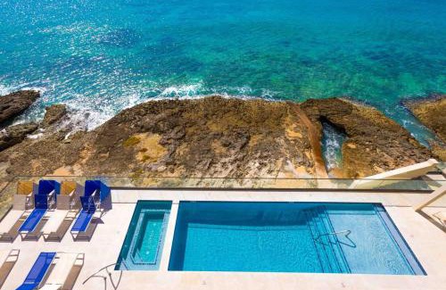 Northwest Point Apartment | SeaDreams 8 - Luxury Condo with Shared Pool, Hot Tub, Rooftop Lounge